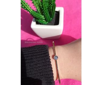 side image for Pulsera dorada con dije plateado  - 1