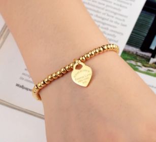 side image for Pulsera corazón colgante - Dorada - 2