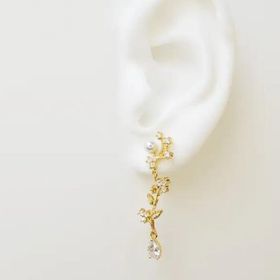 side image for "Aretes Largos Florales de Tallo con Diamantes de CZ y  Baño de Oro de 18K" - 1